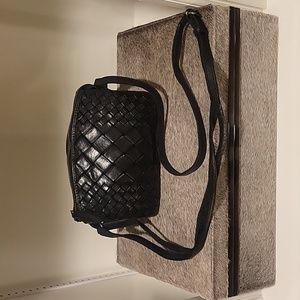 Black woven leather crossbody bag